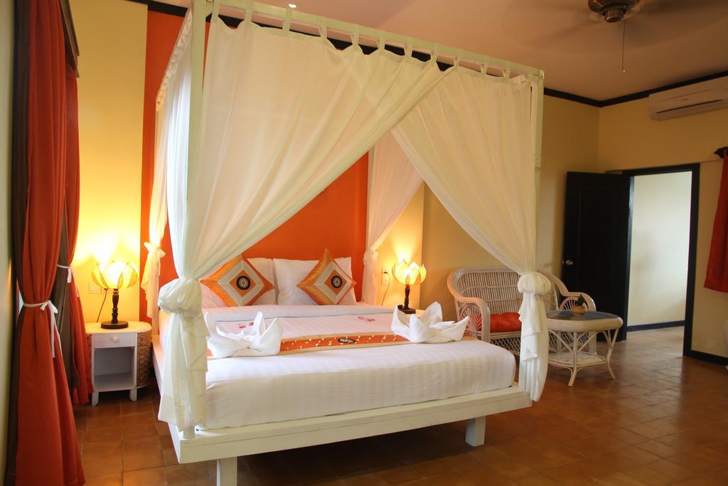 Residence Indochine Suite Сіємреап Номер фото